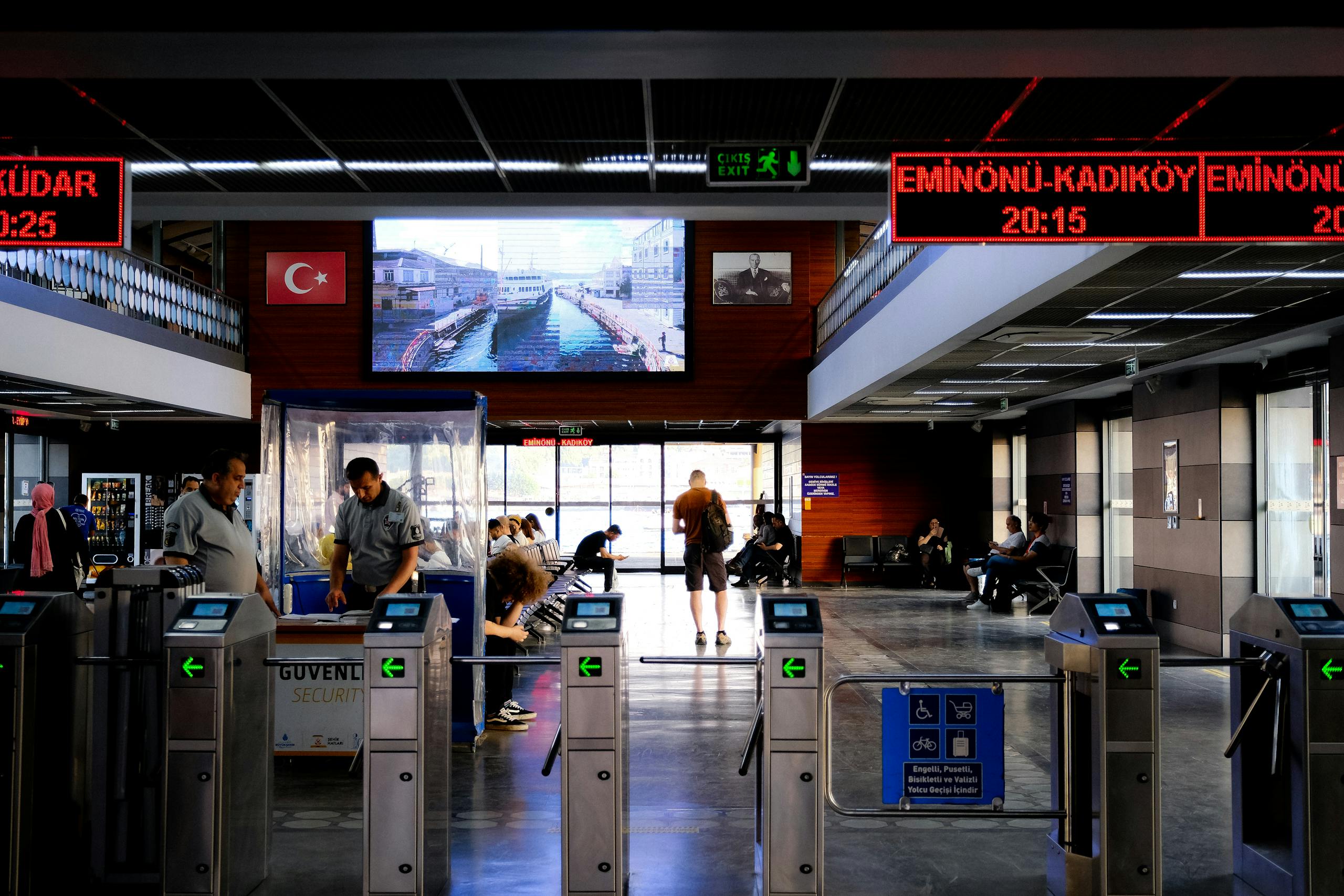 Passengers queue at Üsküdar Ferry Terminal entrance, Istanbul.